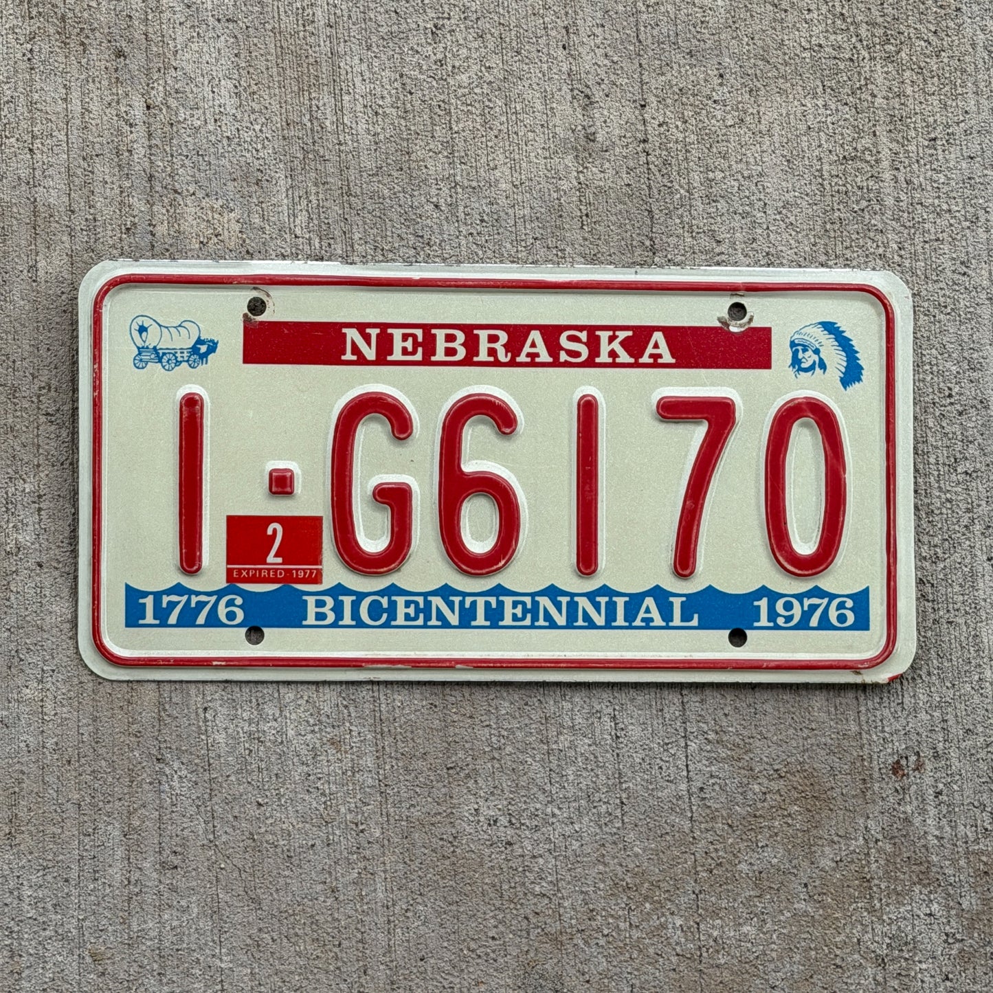 Photo of a 1976 1977 Nebraska License Plate Auto Tag Garage Decor Vintage Bicentennial 1 G6170 with original patina