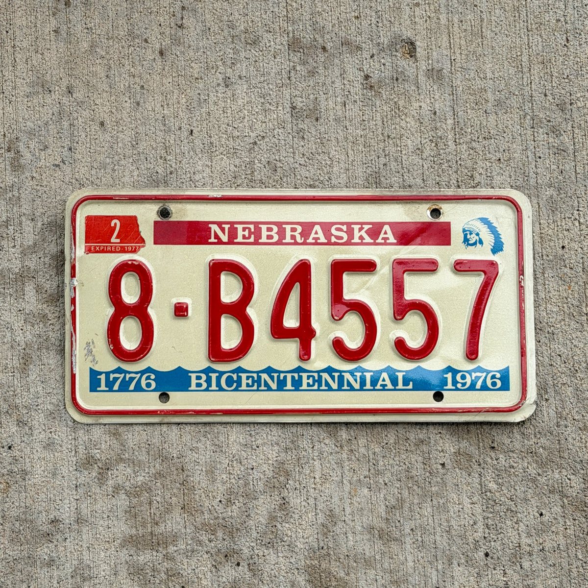 Photo of a 1976 1977 Nebraska License Plate Auto Tag Garage Decor Vintage Bicentennial 8 B4557 with original patina