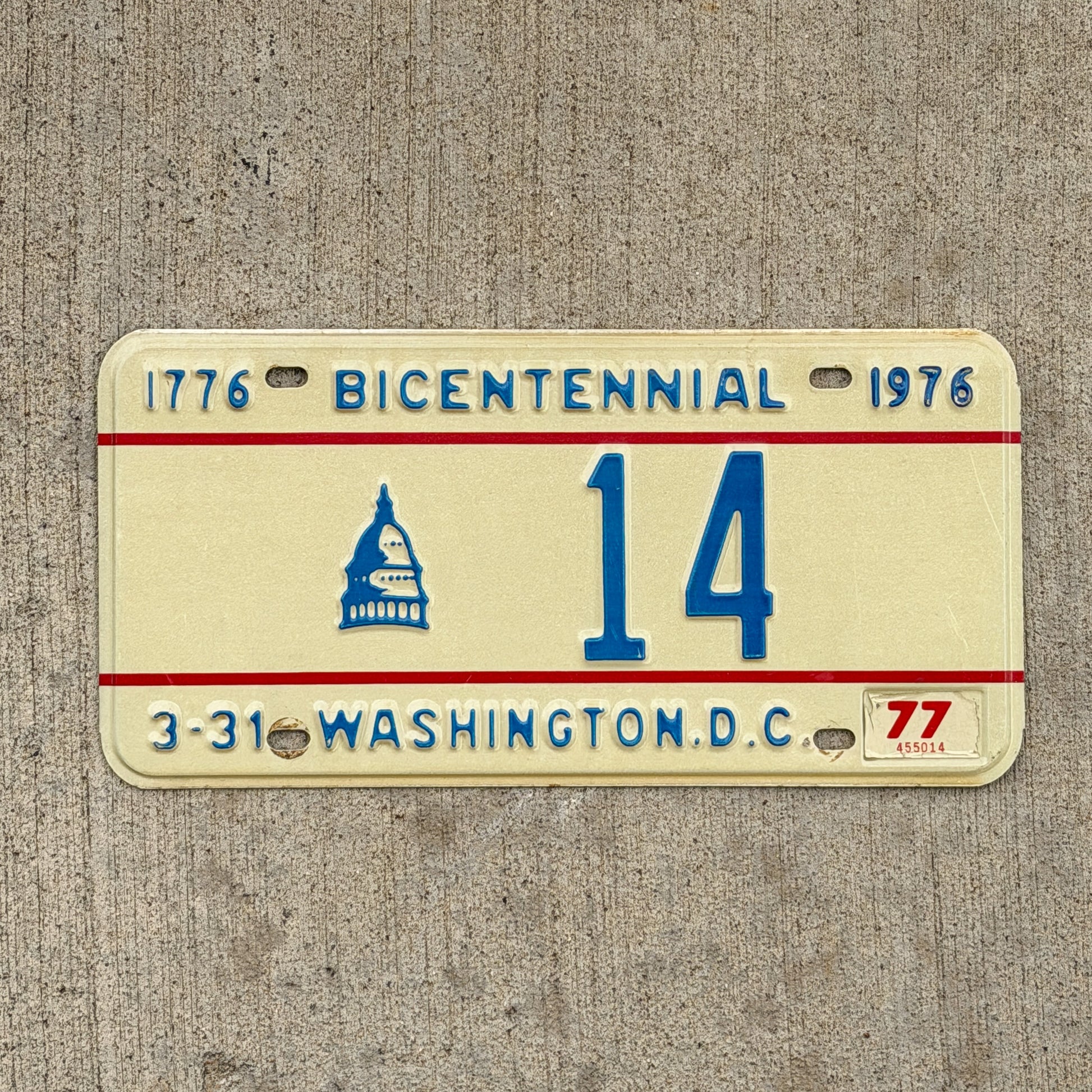 Photo of a 1976 1977 Washington DC License Plate Auto Tag Garage Decor Vintage Low Number Two Digit Bicentennial 14 with original patina