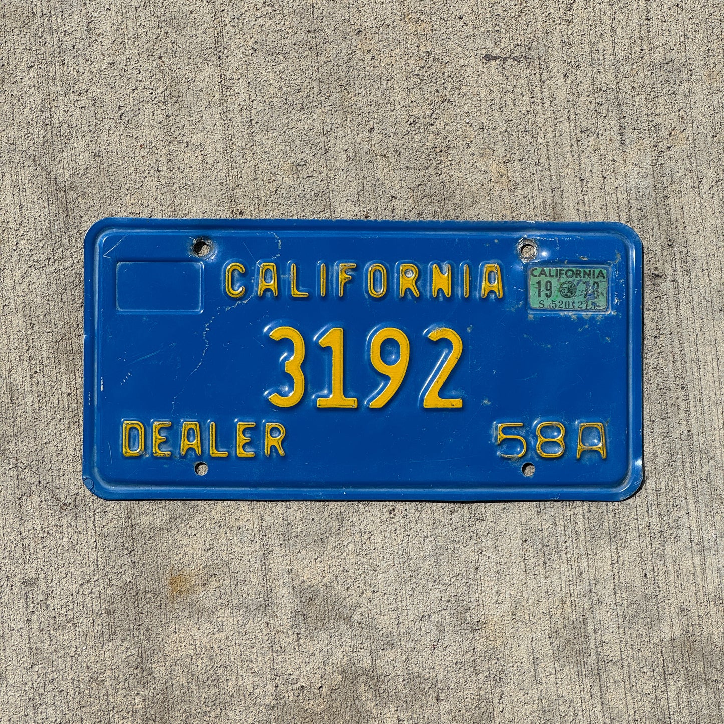 Photo of a 1976 1978 California Dealer License Plate Auto Tag Garage Decor Vintage 3192 with original patina