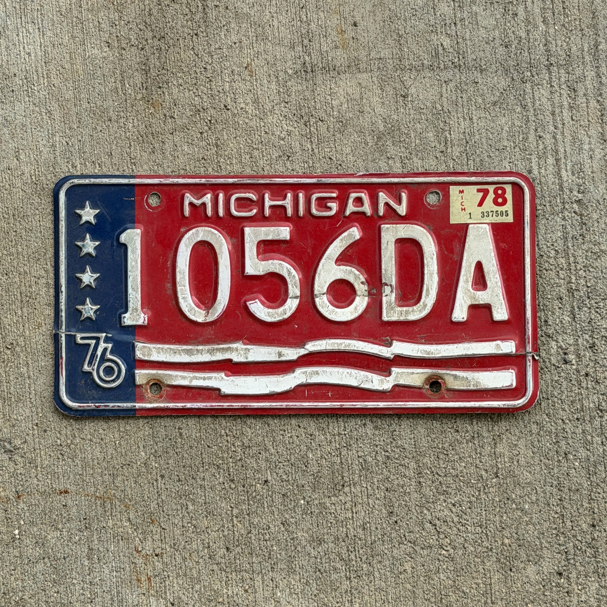 Photo of a 1976 1978 Michigan Commercial License Plate Auto Tag Garage Decor Vintage Bicentennial 1056 DA with original patina