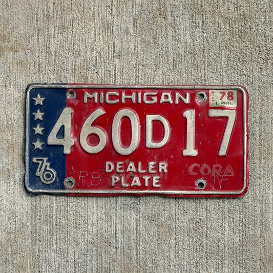 Photo of a 1976 1978 Michigan Dealer License Plate Auto Tag Garage Decor Vintage Bicentennial 460 D 17 with original patina