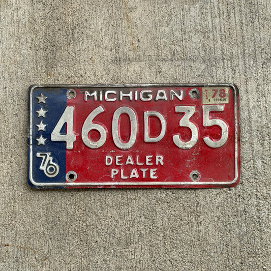 Photo of a 1976 1978 Michigan Dealer License Plate Auto Tag Garage Decor Vintage Bicentennial 460 D 35 with original patina