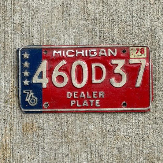 Photo of a 1976 1978 Michigan Dealer License Plate Auto Tag Garage Decor Vintage Bicentennial 460 D 37 with original patina
