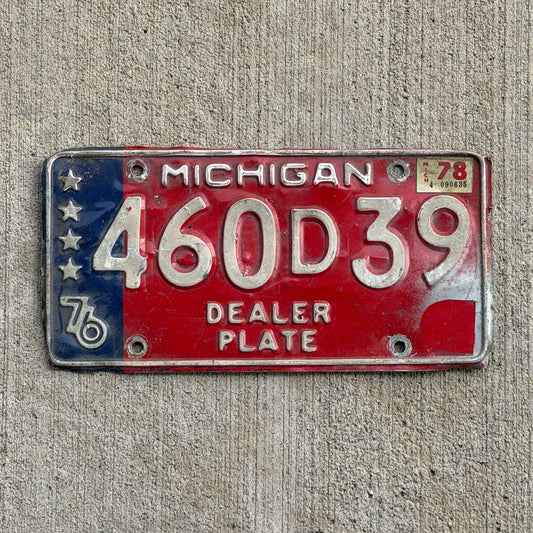 Photo of a 1976 1978 Michigan Dealer License Plate Auto Tag Garage Decor Vintage Bicentennial 460 D 39 with original patina