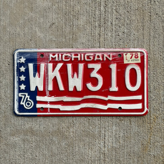 Photo of a 1976 1978 Michigan License Plate Auto Tag Garage Decor Vintage Bicentennial WKW 310 with original patina