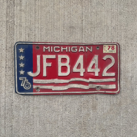 Photo of a 1976 1978 Michigan License Plate Auto Tag Garage Decor Vintage JFB 442 with original patina