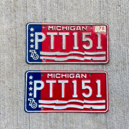 Photo of a 1976 1978 Michigan License Plate Pair Auto Tag Garage Decor Vintage Bicentennial PTT 151 with original patina