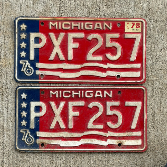 Photo of a 1976 1978 Michigan License Plate Pair Auto Tag Garage Decor Vintage Bicentennial PXF 257 with original patina