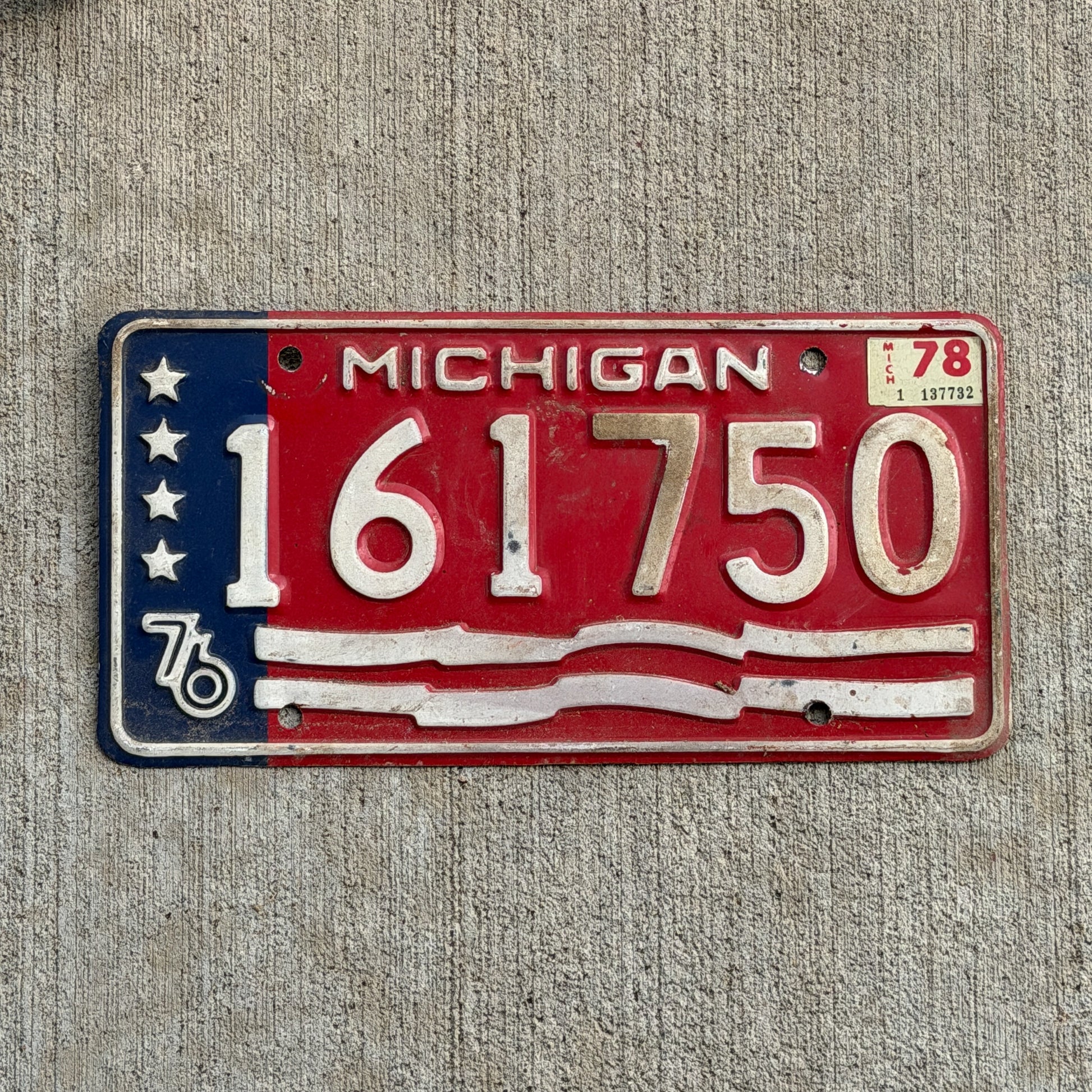Photo of a 1976 1978 Michigan Trailer License Plate Auto Tag Garage Decor Vintage Bicentennial 161 750 with original patina