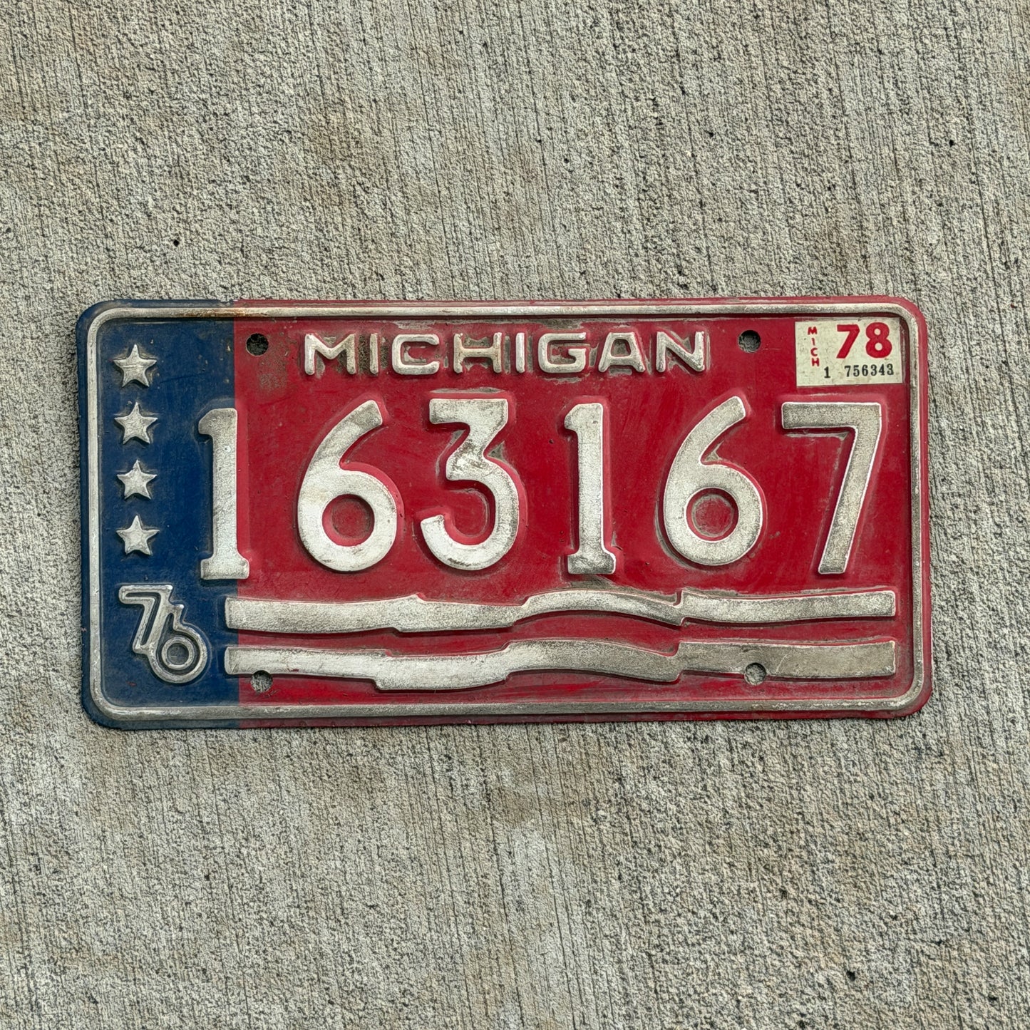 Photo of a 1976 1978 Michigan Trailer License Plate Auto Tag Garage Decor Vintage Bicentennial 163 167 with original patina