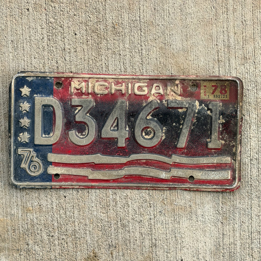 Photo of a 1976 1978 Michigan Trailer License Plate Auto Tag Garage Decor Vintage Bicentennial D 34671 with original patina