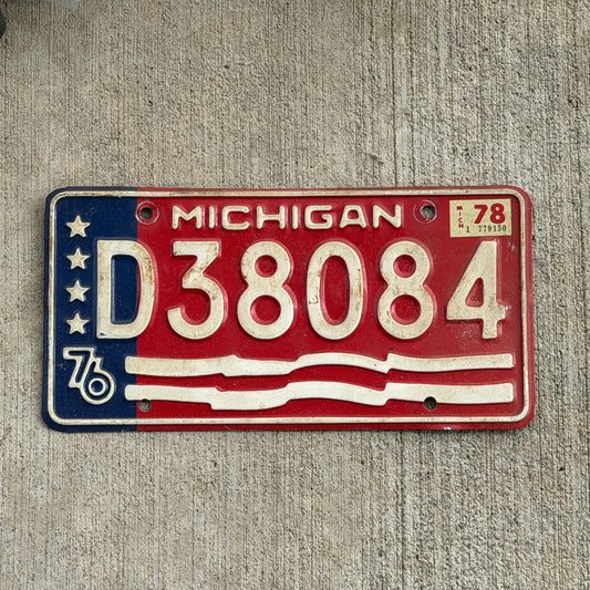 Photo of a 1976 1978 Michigan Trailer License Plate Auto Tag Garage Decor Vintage Bicentennial D 38084 with original patina