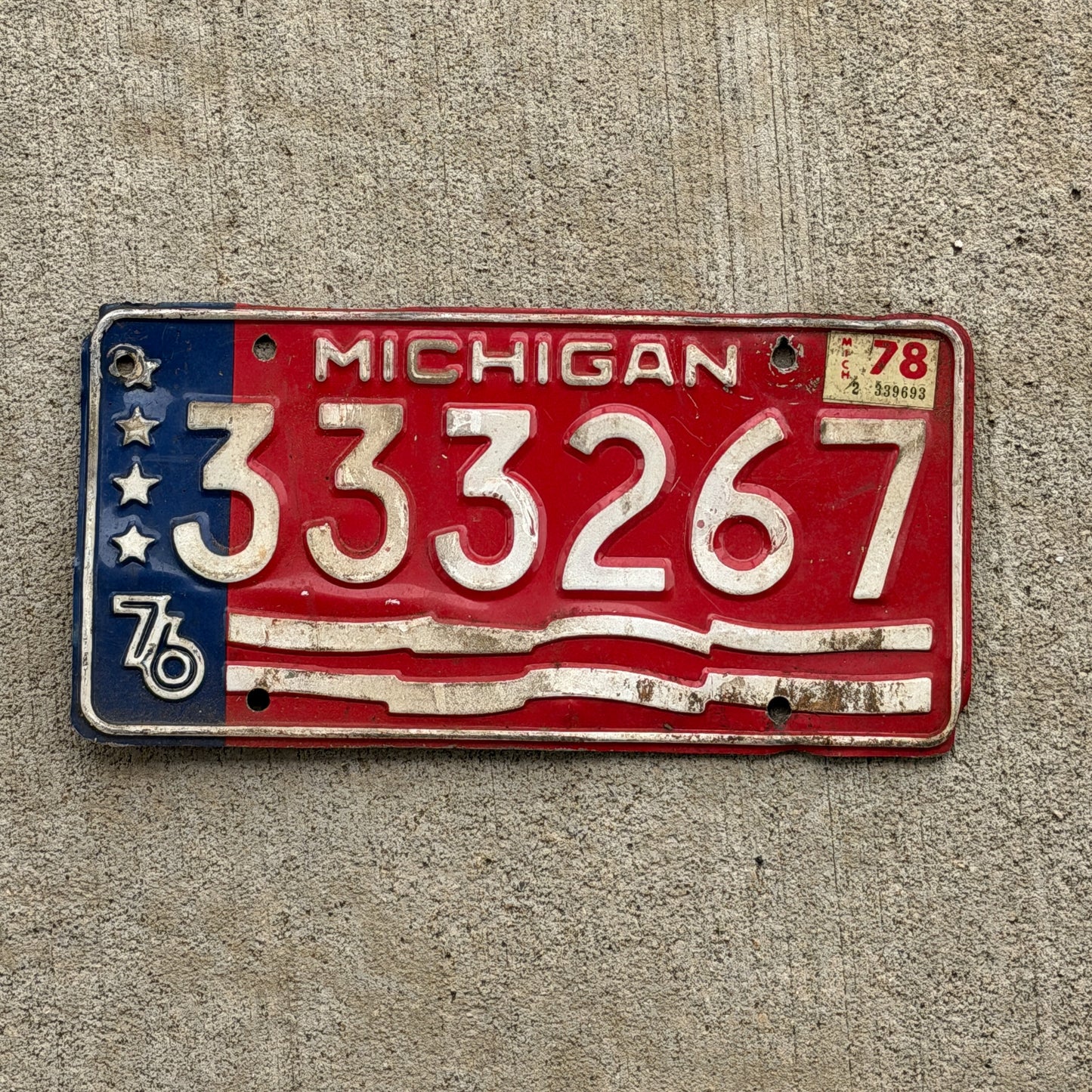Photo of a 1976 1978 Michigan Trailer License Plate Auto Tag Garage Decor Vintage Repeat Repeating 333 267 with original patina
