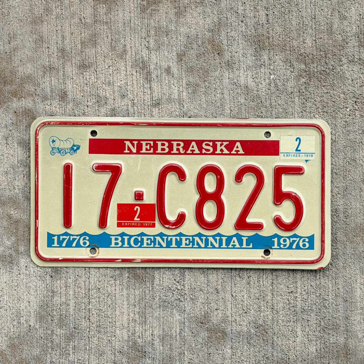Photo of a 1976 1978 Nebraska License Plate Auto Tag Garage Decor Vintage Bicentennial 17 C825 with original patina