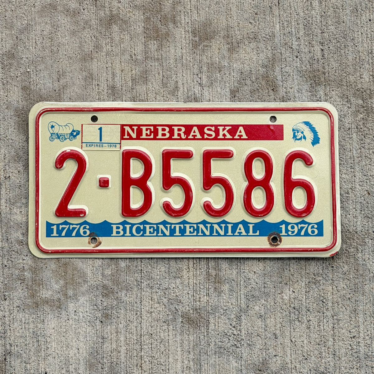 Photo of a 1976 1978 Nebraska License Plate Auto Tag Garage Decor Vintage Bicentennial 2 B5586 with original patina