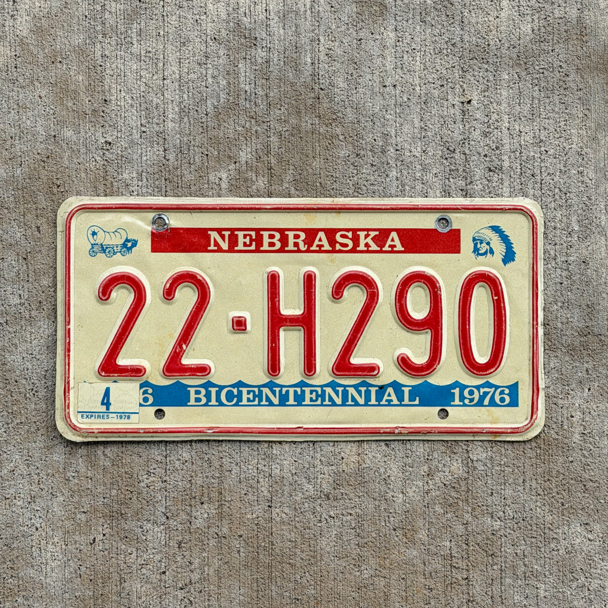 Photo of a 1976 1978 Nebraska License Plate Auto Tag Garage Decor Vintage Bicentennial 22 H290 with original patina