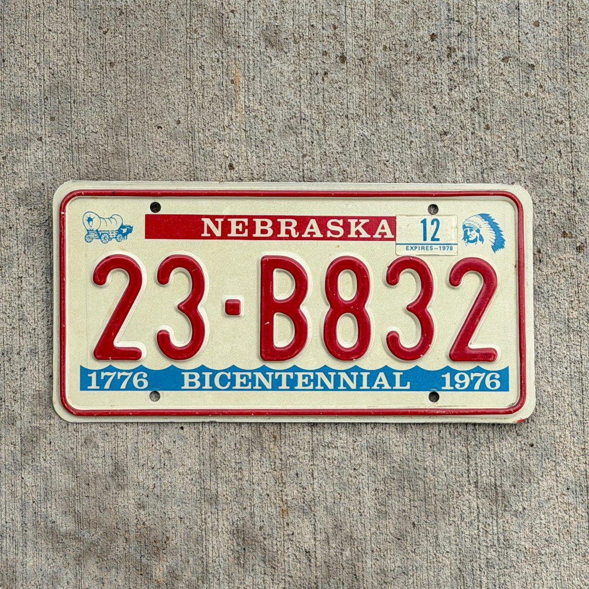 Photo of a 1976 1978 Nebraska License Plate Auto Tag Garage Decor Vintage Bicentennial 23 B832 with original patina