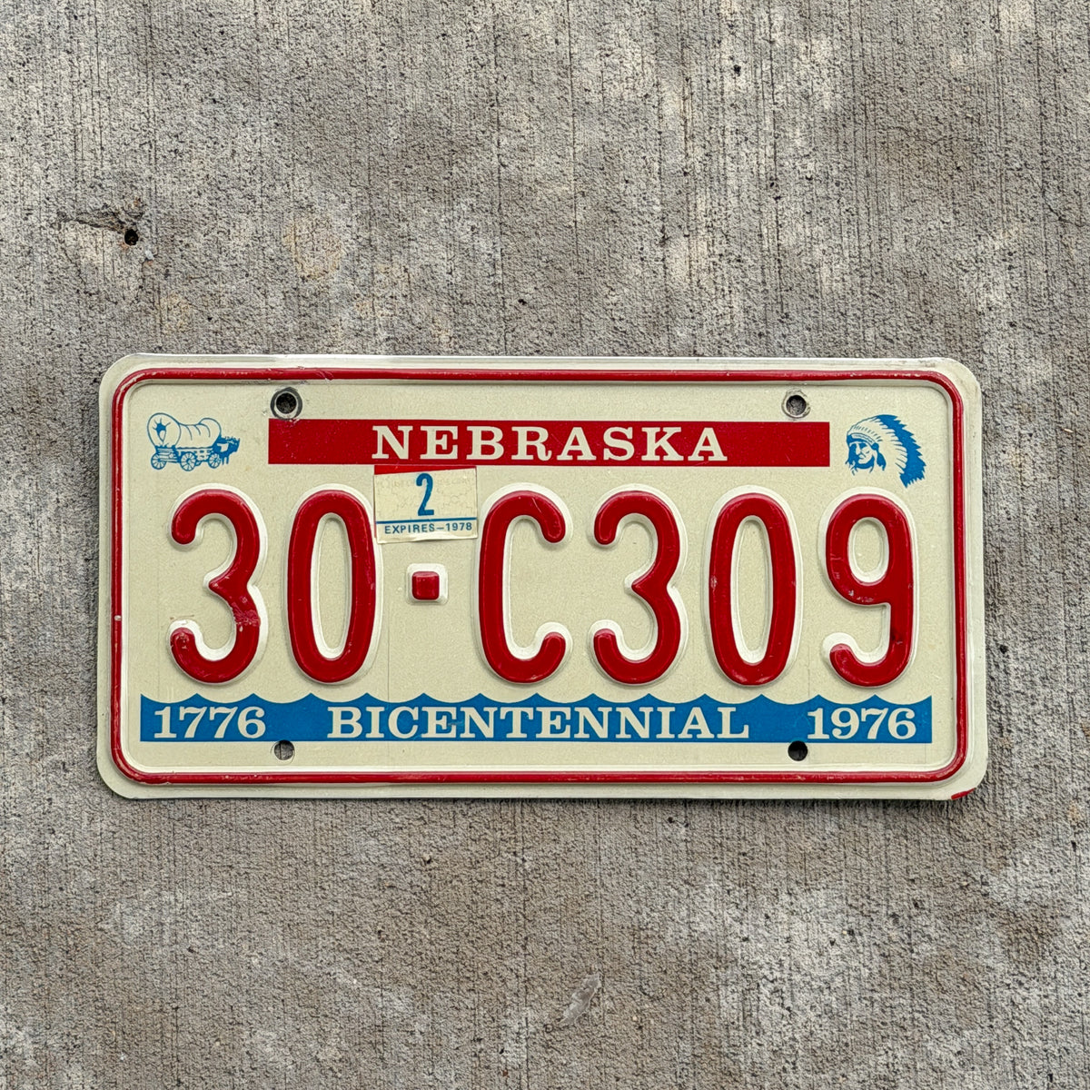 Photo of a 1976 1978 Nebraska License Plate Auto Tag Garage Decor Vintage Bicentennial 30 C309 with original patina