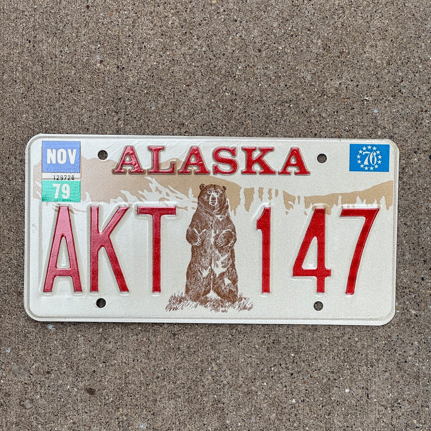 Photo of a 1976 1979 Alaska License Plate Auto Tag Garage Decor Vintage High Quality AKT 147 with original patina