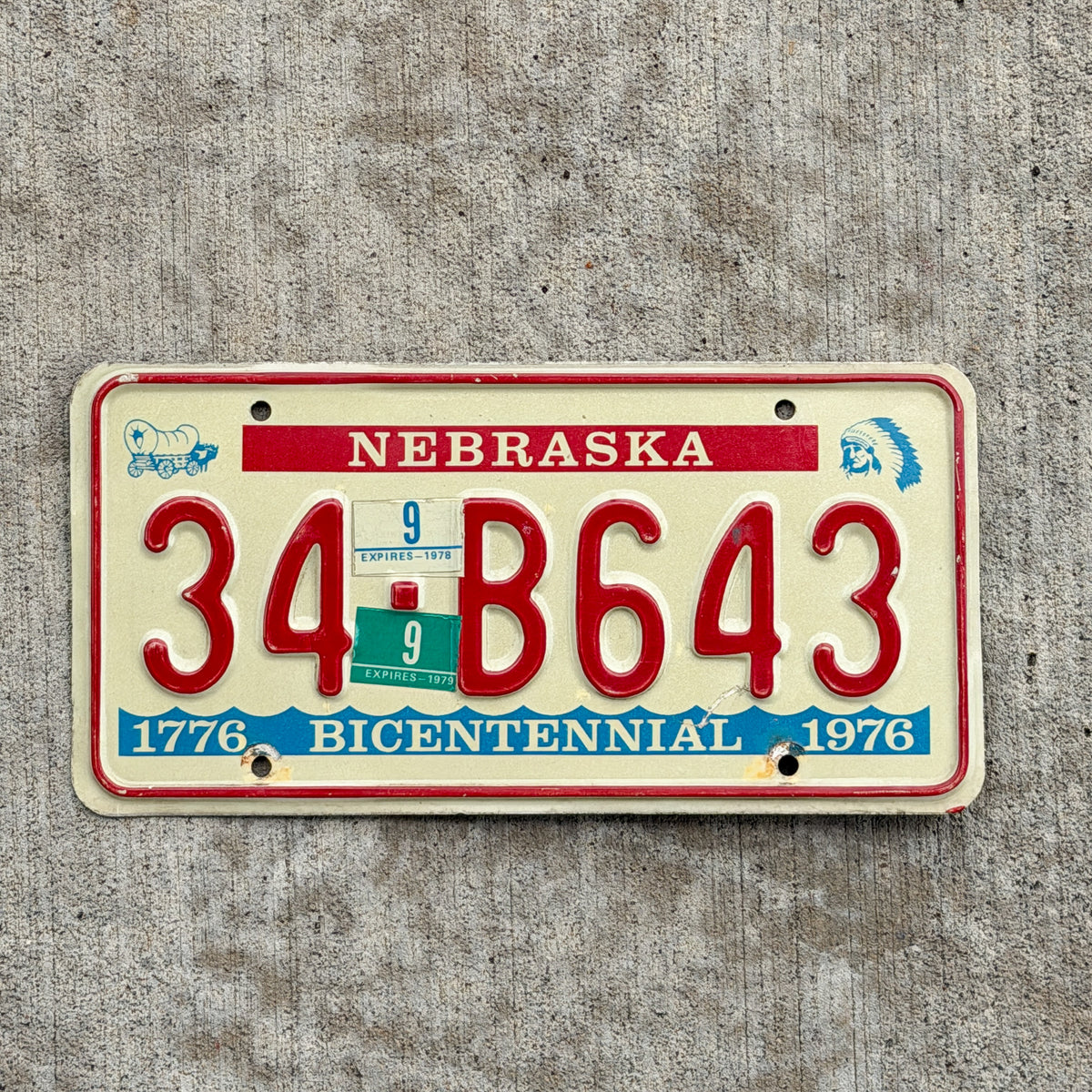Photo of a 1976 1979 Nebraska License Plate Auto Tag Garage Decor Vintage Bicentennial 34 B643 with original patina