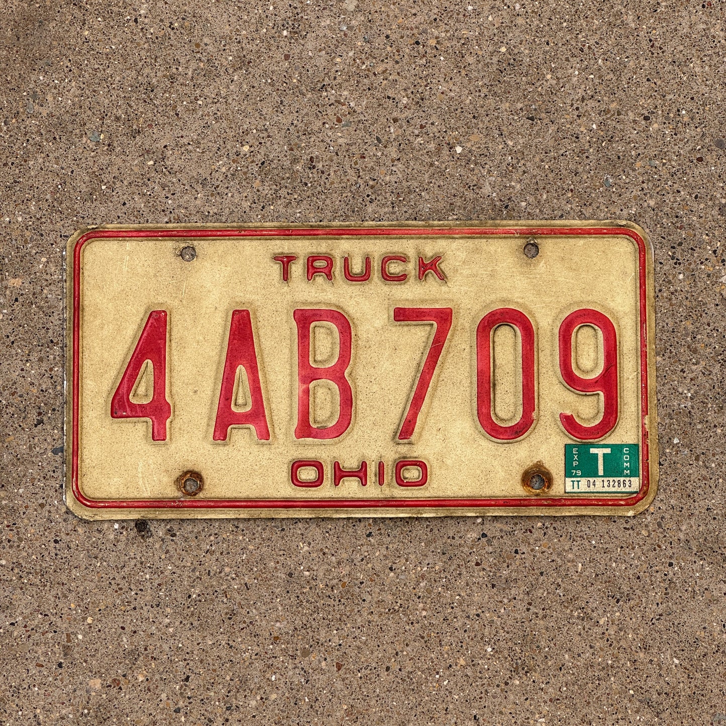 Photo of a 1976 1979 Ohio Truck License Plate Auto Tag 1 Vintage Garage 4 AB 709 with original patina