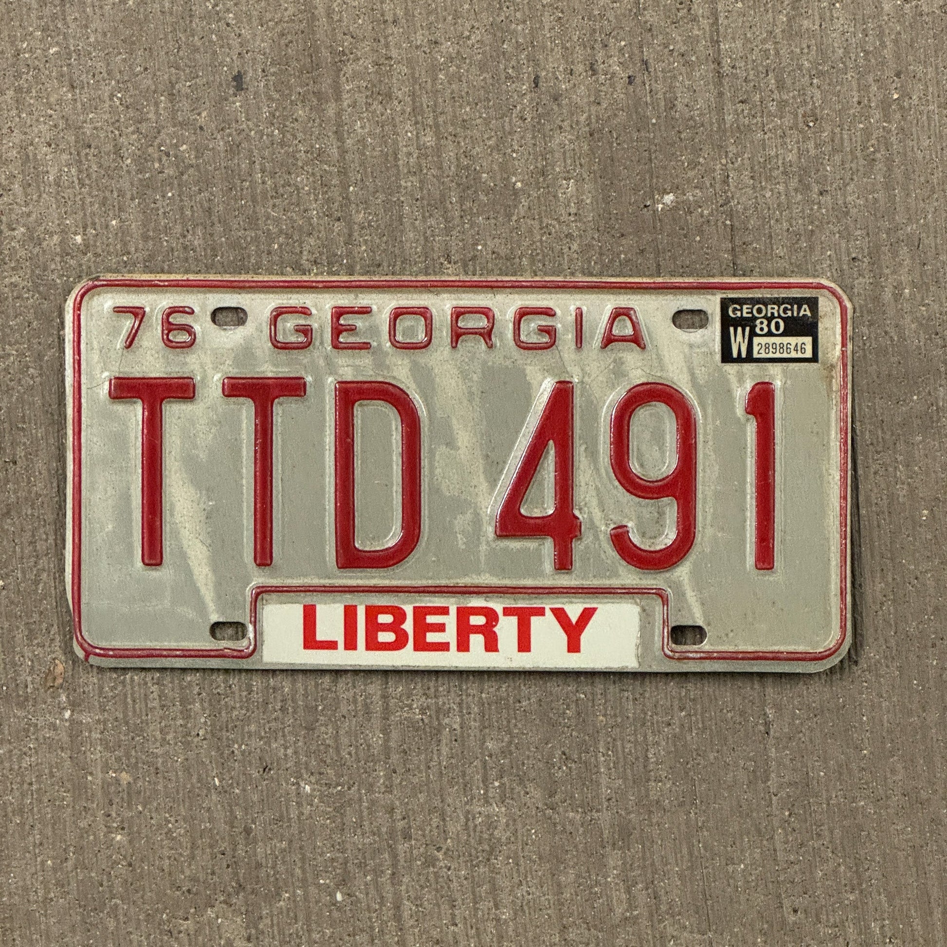 Photo of a 1976 1980 Georgia License Plate Auto Tag Garage Decor Vintage TTD 491 with original patina