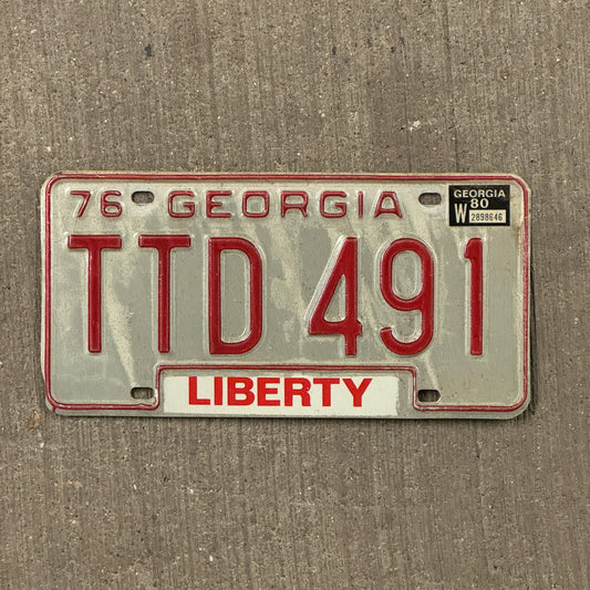 Photo of a 1976 1980 Georgia License Plate Auto Tag Garage Decor Vintage TTD 491 with original patina