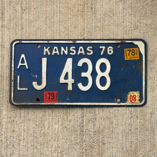 Photo of a 1976 1980 Kansas License Plate Auto Tag Garage Decor Vintage AL J 438 with original patina