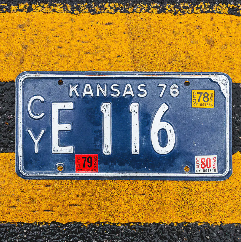 Photo of a 1976 1980 Kansas License Plate Auto Tag Garage Decor Vintage CY E 116 with original patina