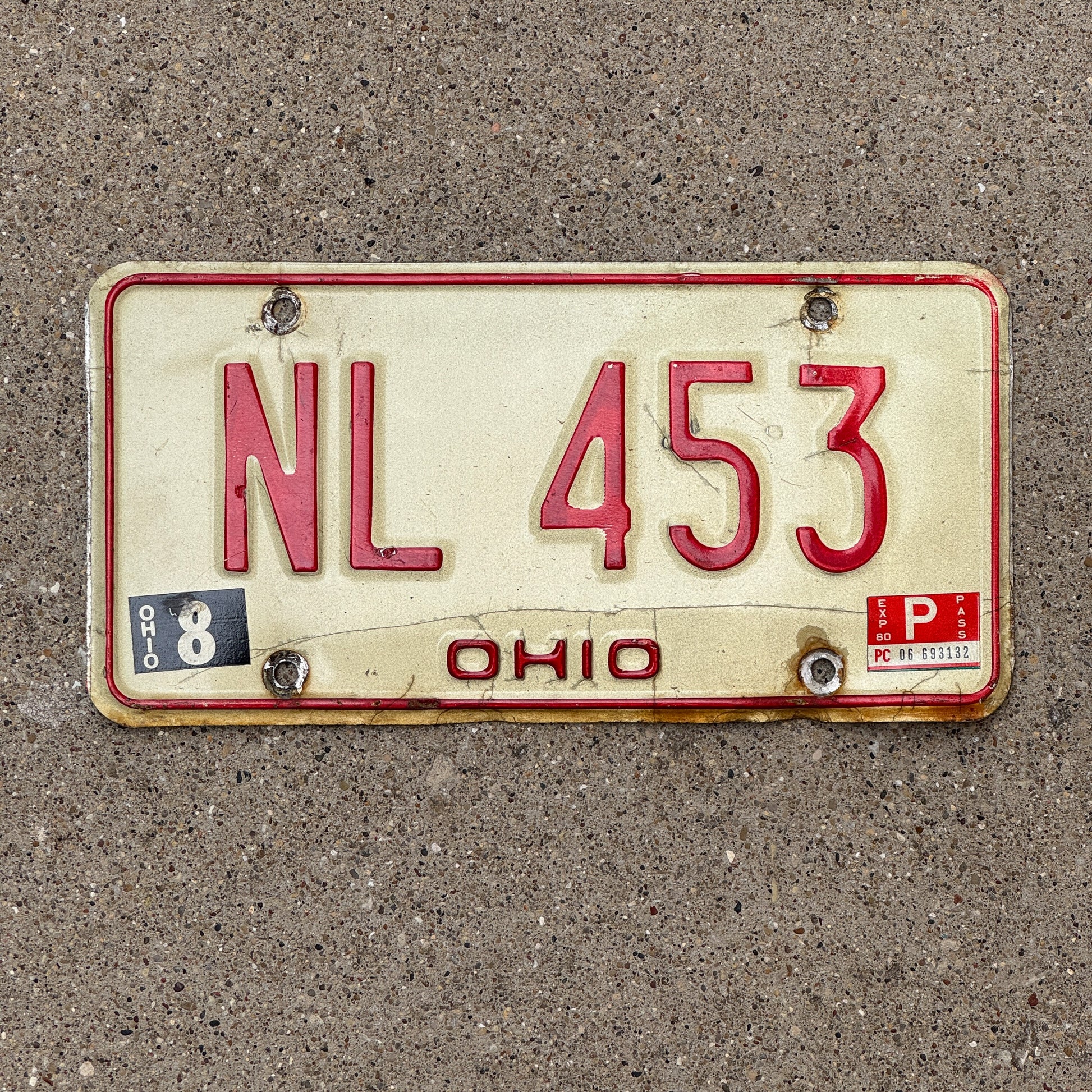 Photo of a 1976 1980 Ohio License Plate Auto Tag 1 Vintage Garage NL 453 with original patina