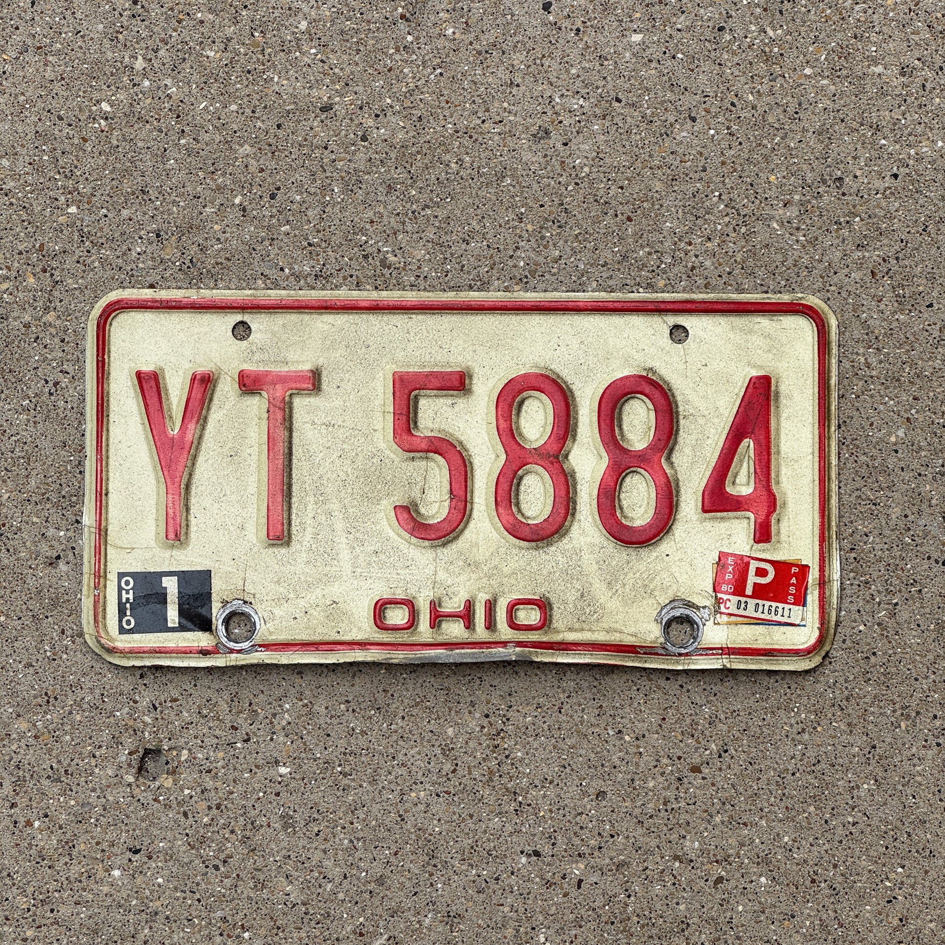 Photo of a 1976 1980 Ohio License Plate Auto Tag 1 Vintage Garage YT 5884 with original patina