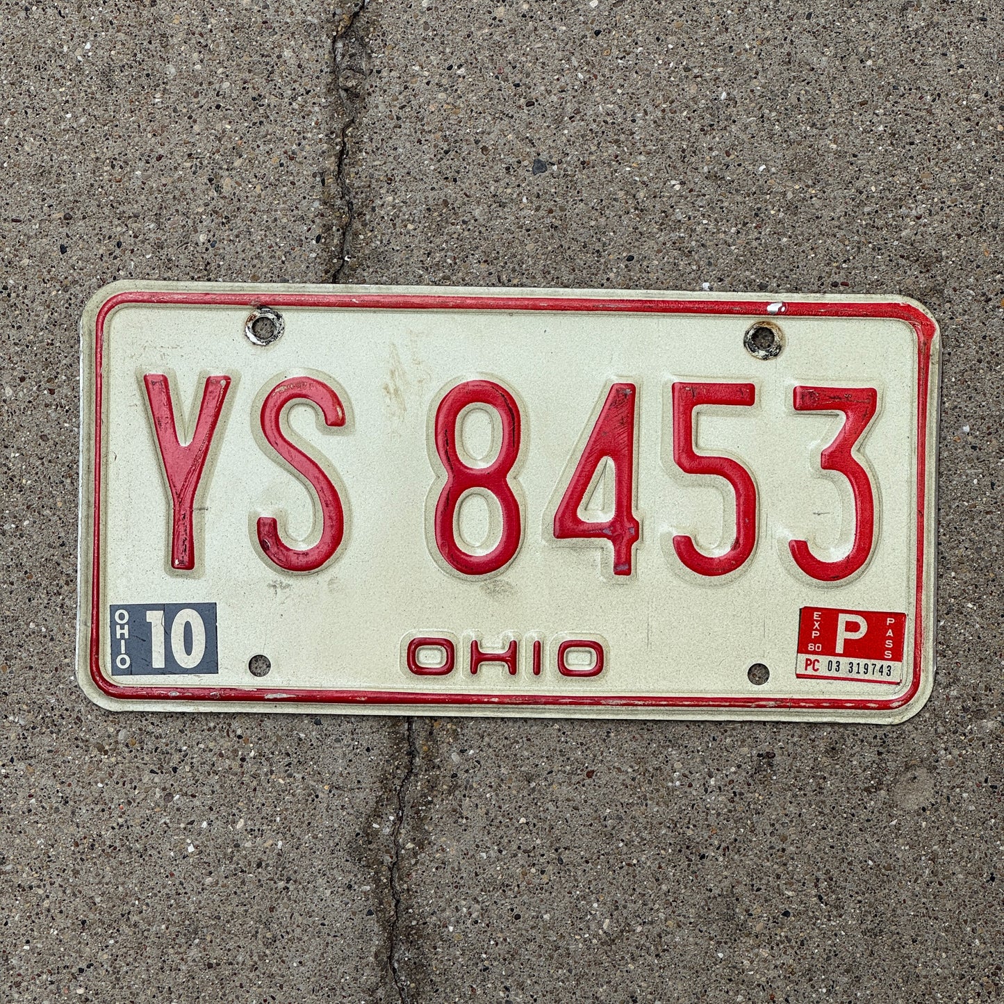 Photo of a 1976 1980 Ohio License Plate Auto Tag 2 Vintage Garage YS 8453 with original patina