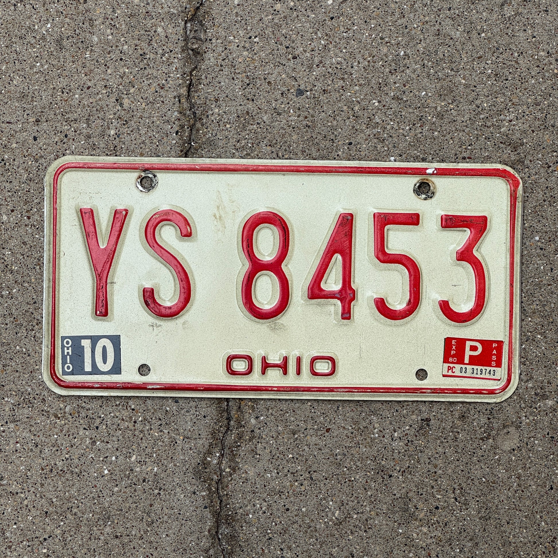 Photo of a 1976 1980 Ohio License Plate Auto Tag 2 Vintage Garage YS 8453 with original patina