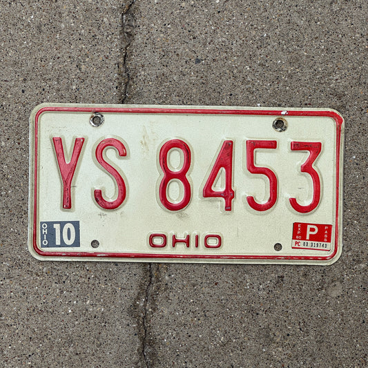 Photo of a 1976 1980 Ohio License Plate Auto Tag 2 Vintage Garage YS 8453 with original patina