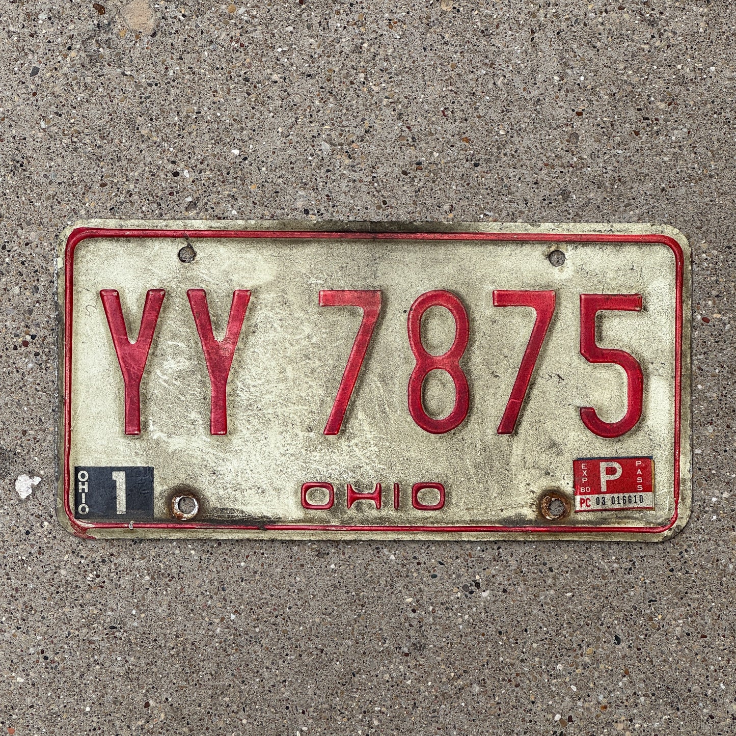 Photo of a 1976 1980 Ohio License Plate Auto Tag 2 Vintage Garage YY 7875 with original patina