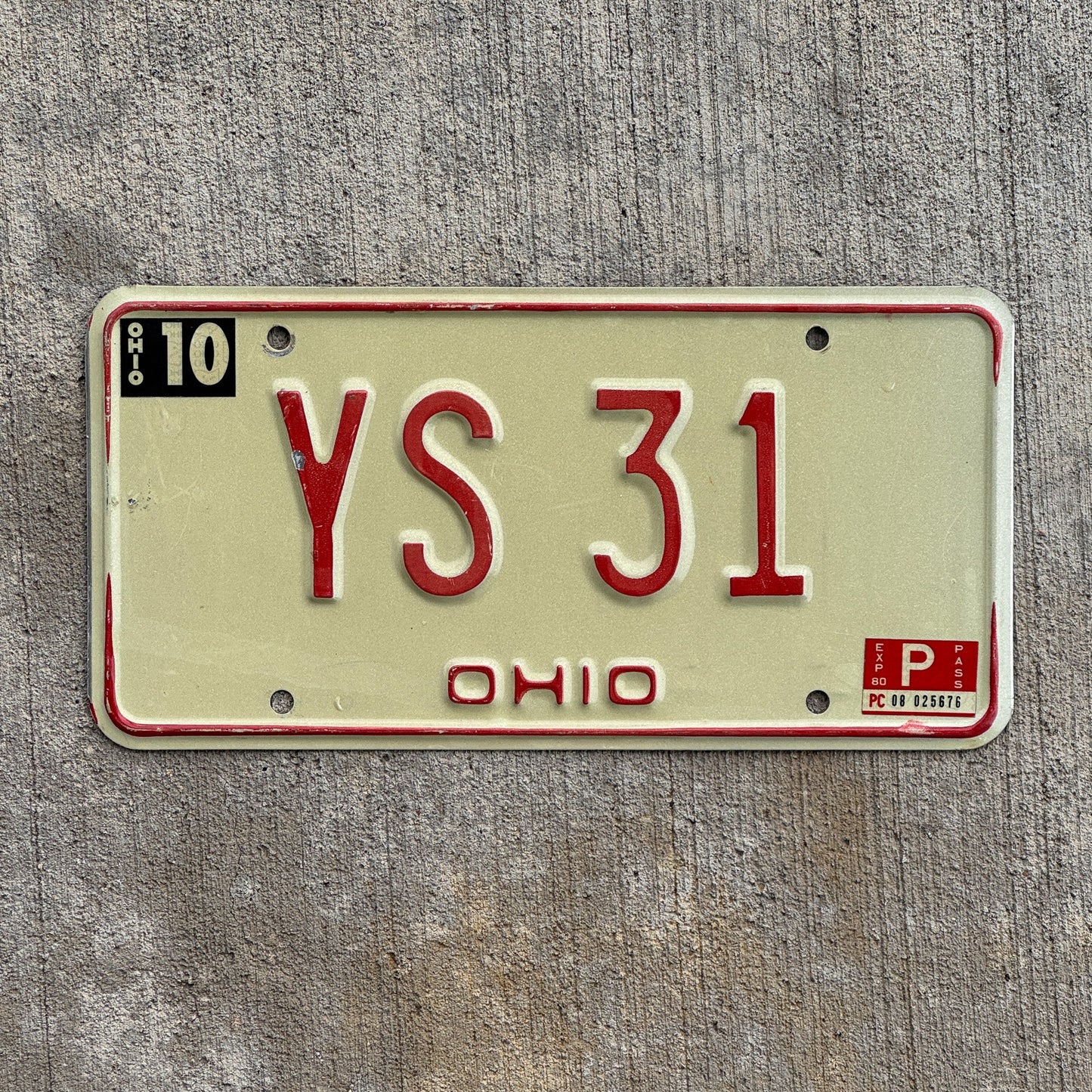 Photo of a 1976 1980 Ohio License Plate Auto Tag Garage Decor Vintage Low Number Two Digit YS 31 with original patina