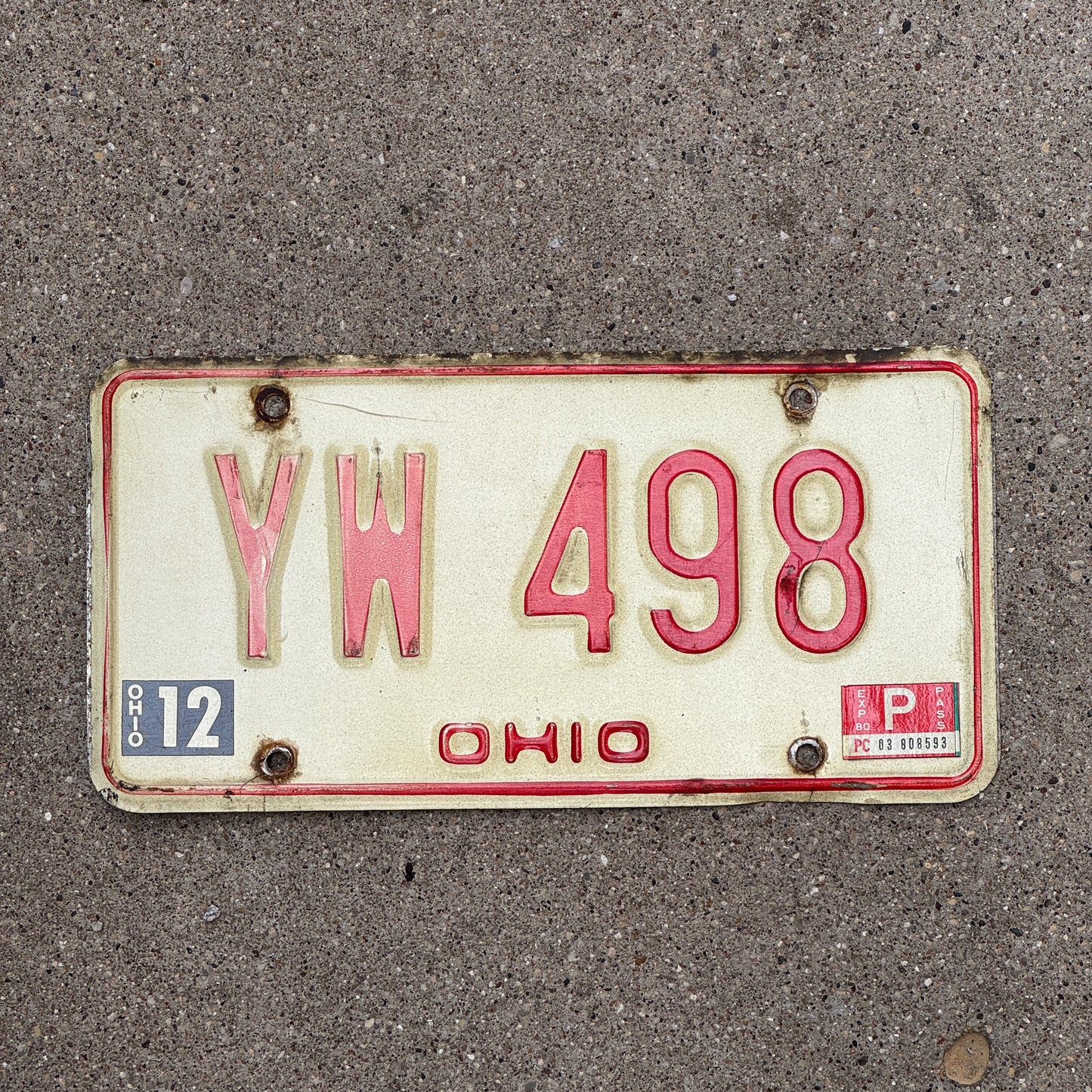 Photo of a 1976 1980 Ohio License Plate Auto Tag Garage Decor Vintage YW 498 with original patina
