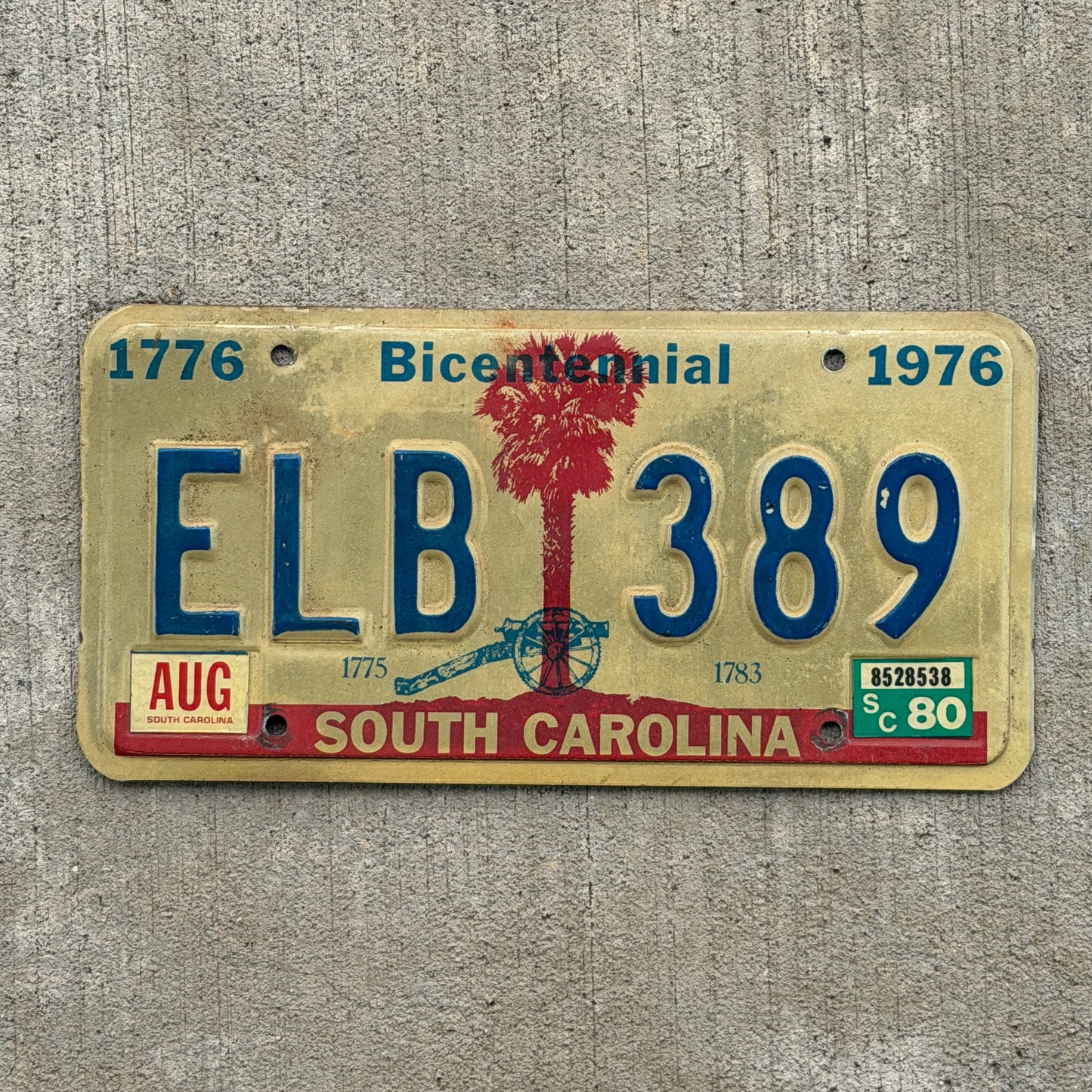 Photo of a 1976 1980 South Carolina License Plate Auto Tag Garage Decor Vintage Bicentennial ELB 389 with original patina