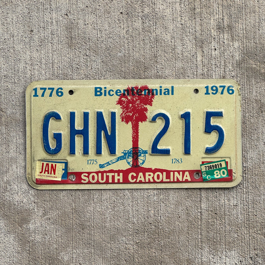 Photo of a 1976 1980 South Carolina License Plate Auto Tag Garage Decor Vintage Bicentennial GHN 215 with original patina