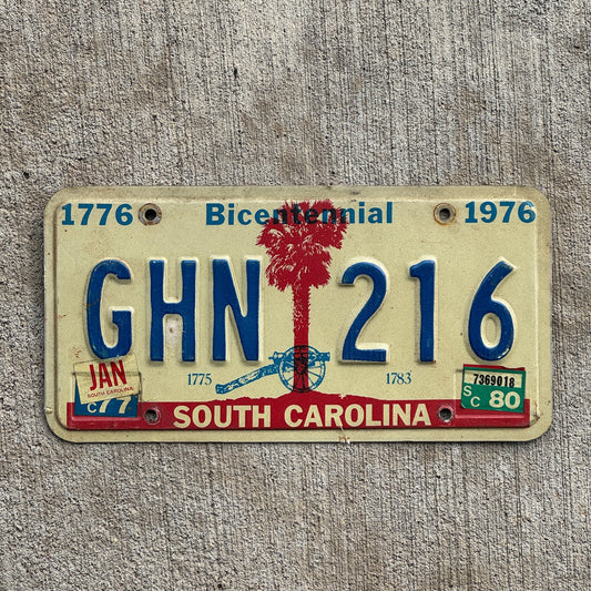 Photo of a 1976 1980 South Carolina License Plate Auto Tag Garage Decor Vintage Bicentennial GHN 216 with original patina