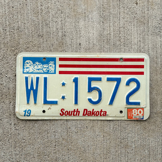 Photo of a 1976 1980 South Dakota License Plate Auto Tag Garage Decor Vintage WL 1572 with original patina