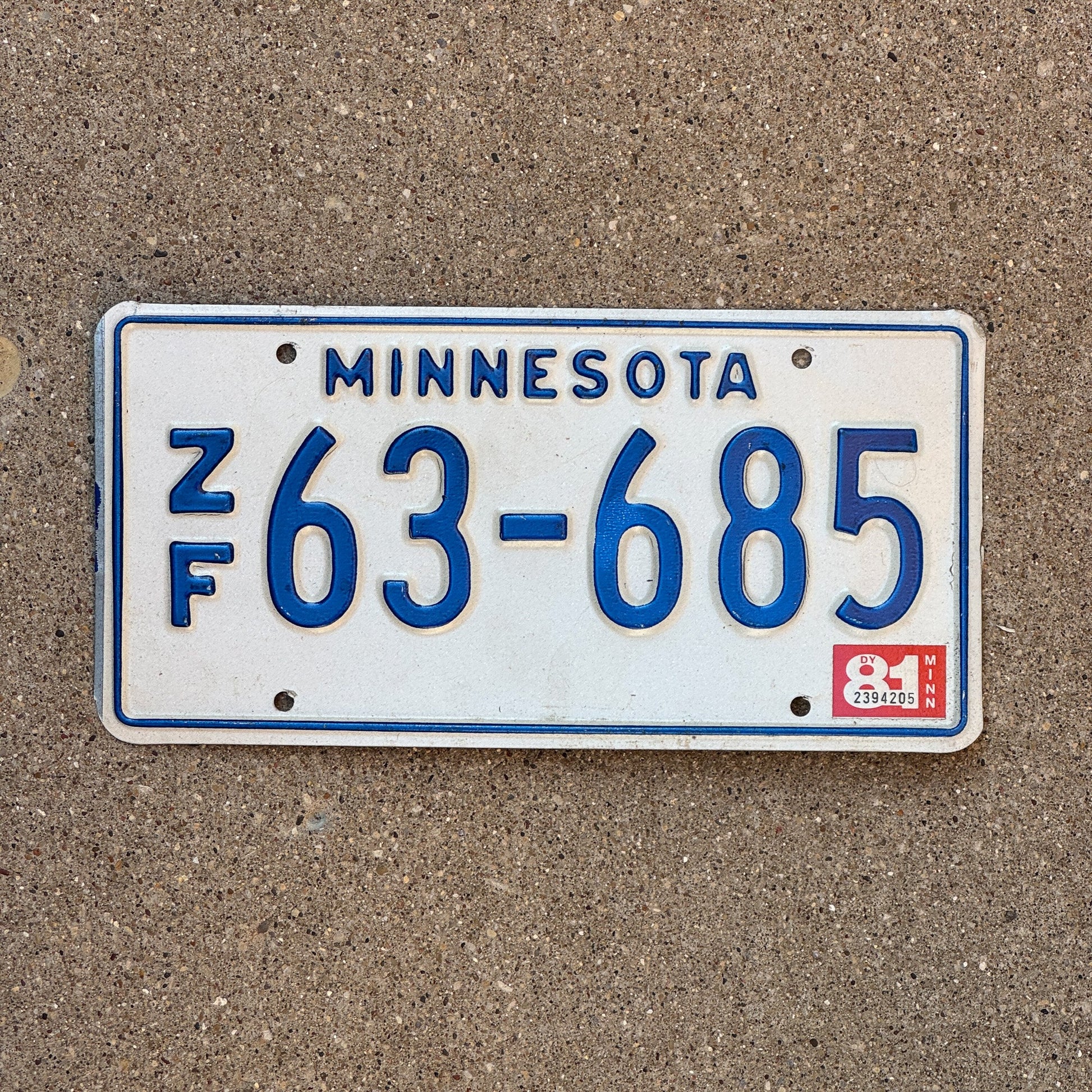 Photo of a 1976 1981 Minnesota Trailer License Plate Auto Tag Garage Decor Vintage ZF 63 685