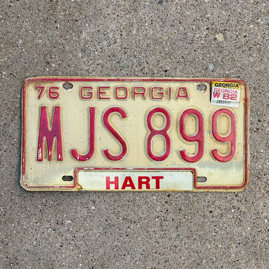 Photo of a 1976 1982 Georgia License Plate Auto Tag Garage Decor Vintage Inverted W MJS 899 with original patina