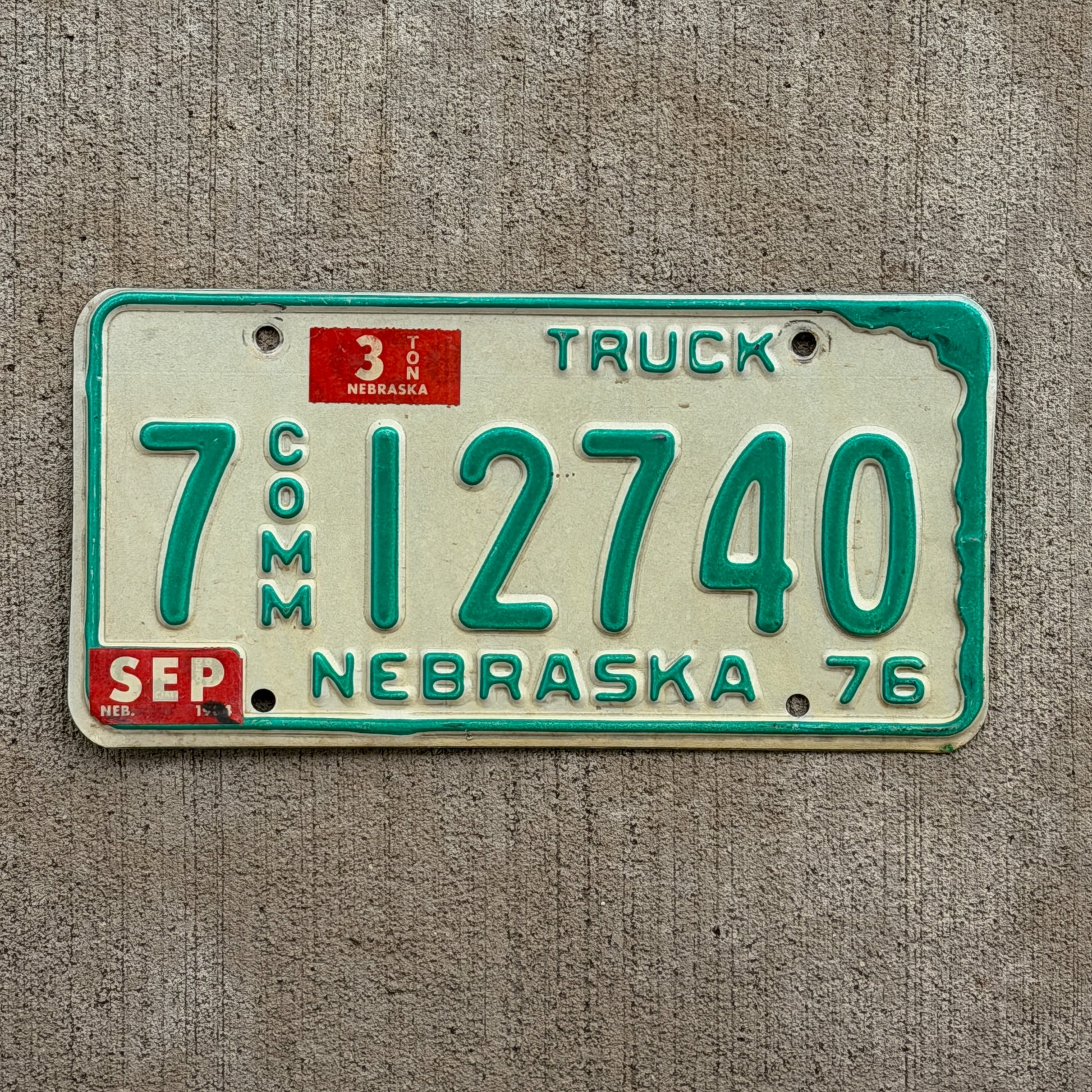 Photo of a 1976 1984 Nebraska Commercial License Plate Auto Tag Garage Decor Vintage 7 12740 with original patina