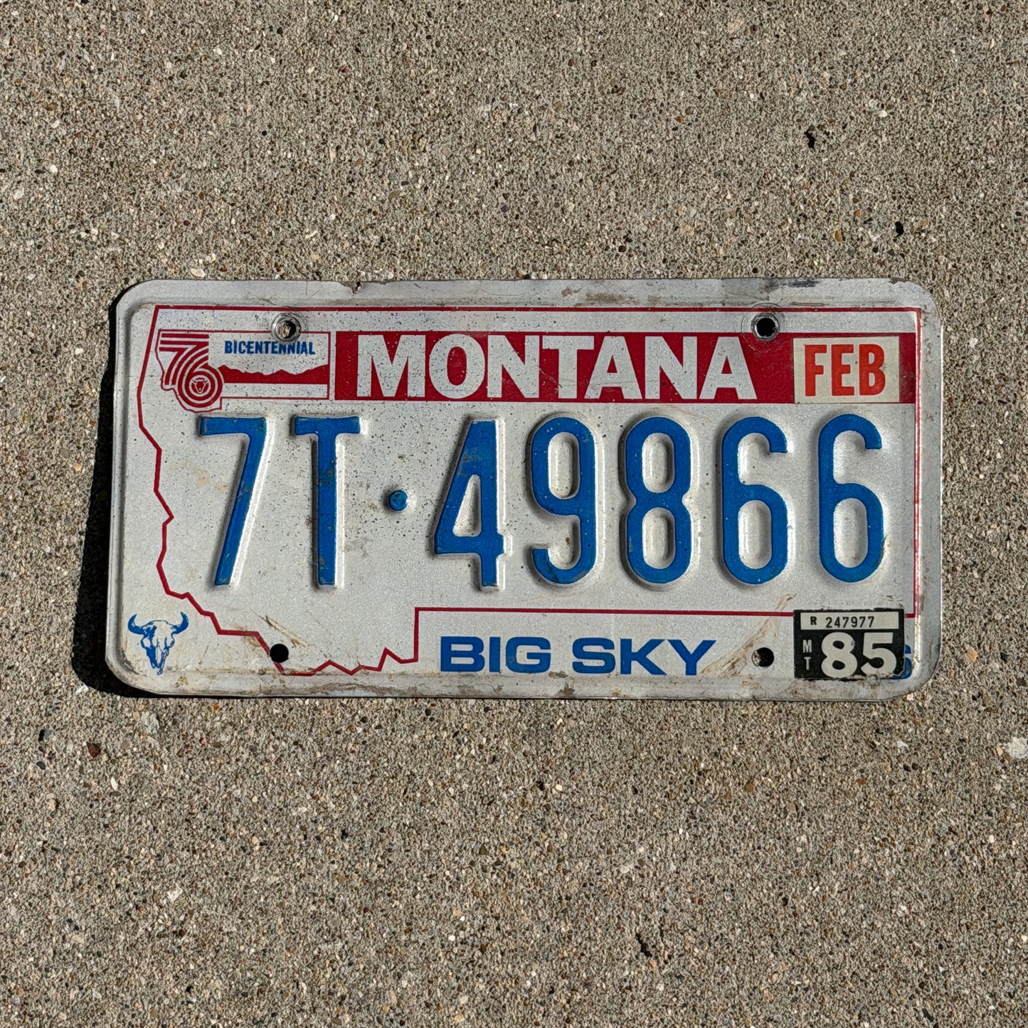 Photo of a 1976 1985 Montana Truck License Plate Auto Tag Garage Decor Vintage Bicentennial 7T 49866 with original patina