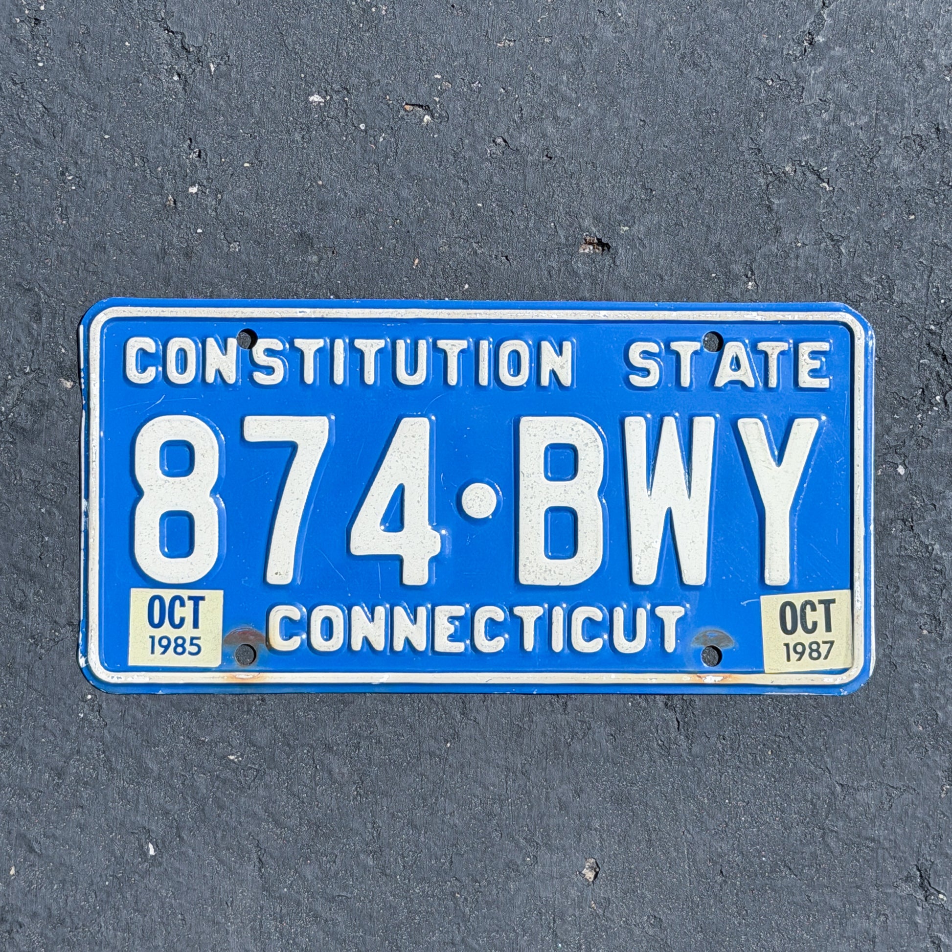 Photo of a 1976 1987 Connecticut License Plate Auto Tag Garage Decor Vintage 874 BWY with original patina