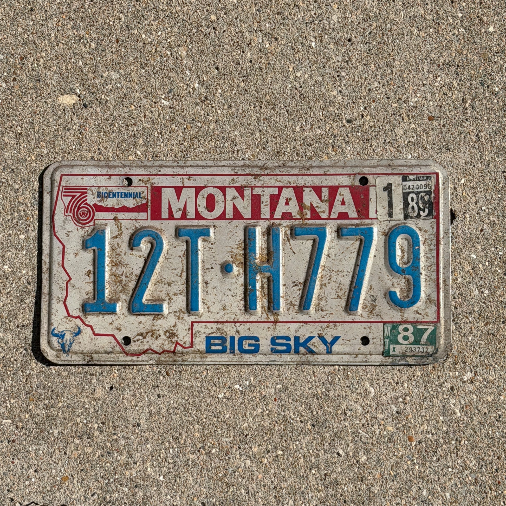 Photo of a 1976 1989 Montana Truck License Plate Auto Tag Garage Decor Vintage Bicentennial 12 TH 779 with original patina