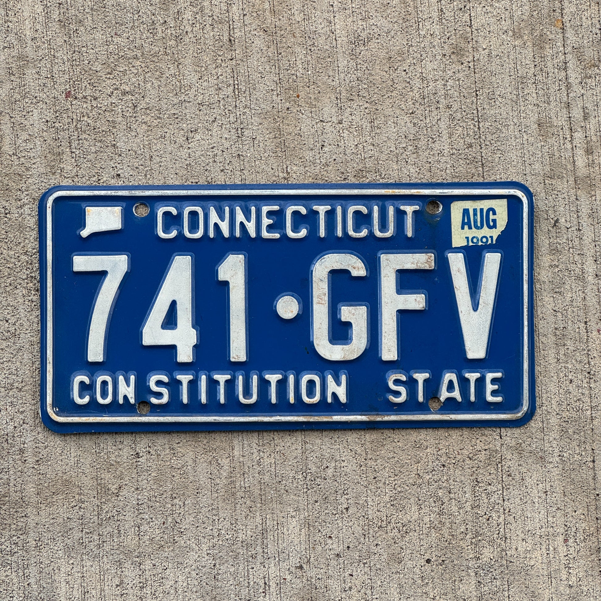 Photo of a 1976 1991 Connecticut License Plate Auto Tag Garage Decor Vintage 741 GFV with original patina