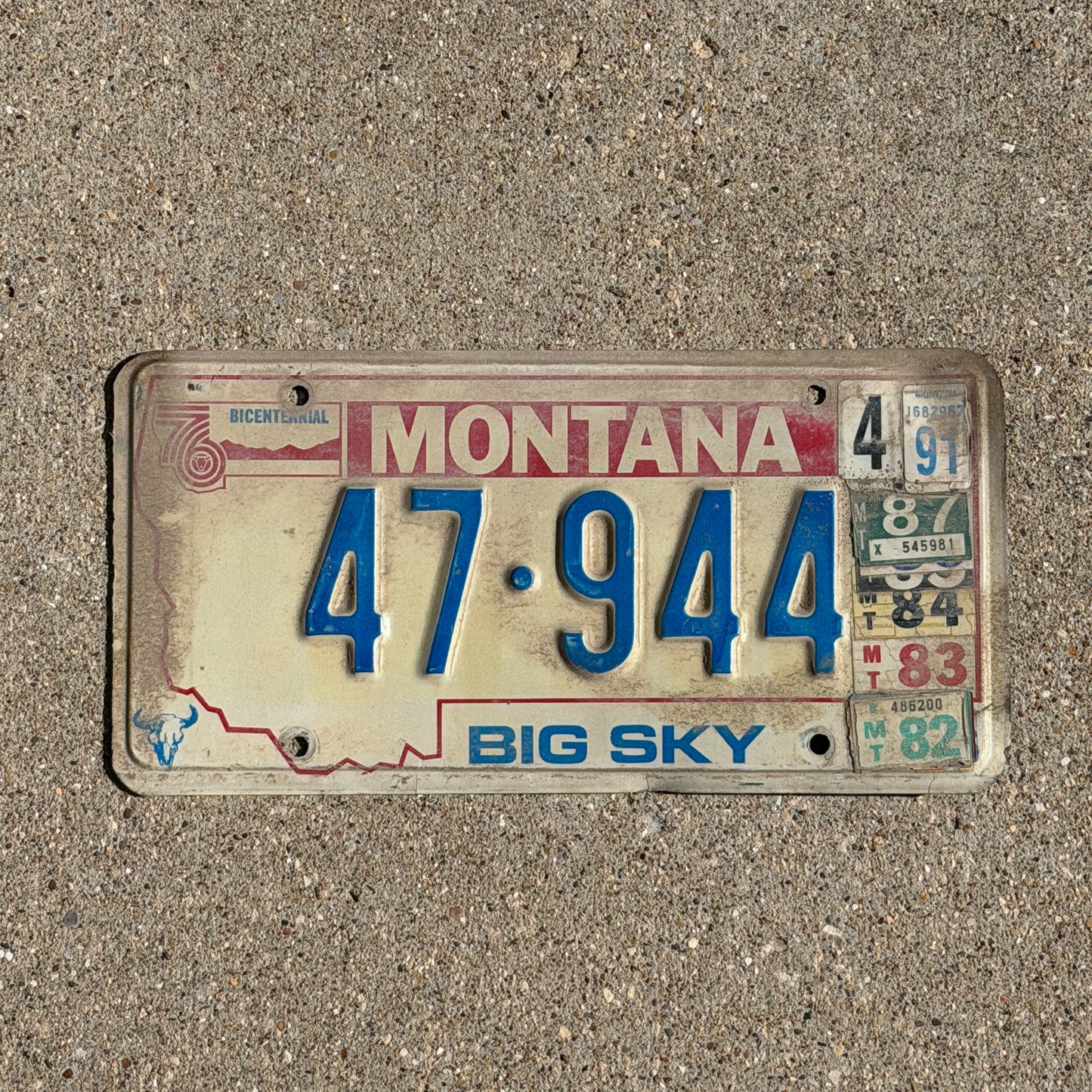 Photo of a 1976 1991 Montana License Plate Auto Tag Garage Decor Vintage Bicentennial 47 944 with original patina